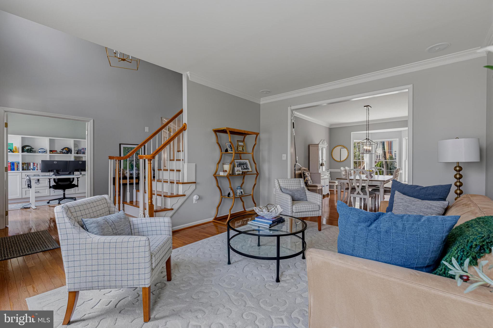 1403 Harle Place Southwest Leesburg, VA 20175 - Photo 14 of 41 a living room with furniture and a wooden floor