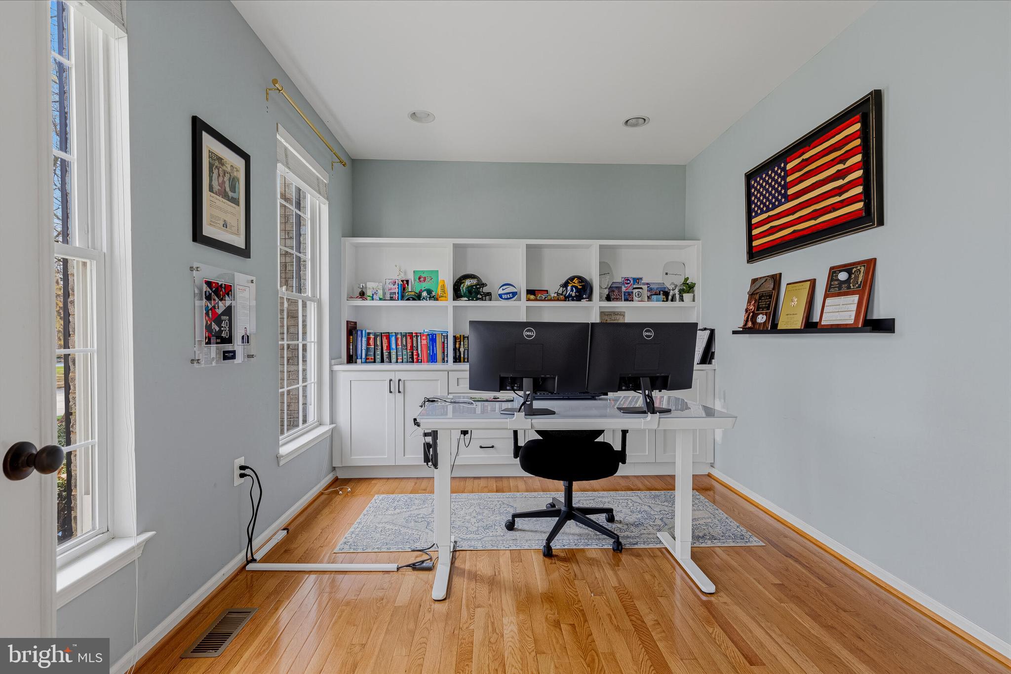 1403 Harle Place Southwest Leesburg, VA 20175 - Photo 16 of 41 a living room with furniture and a table