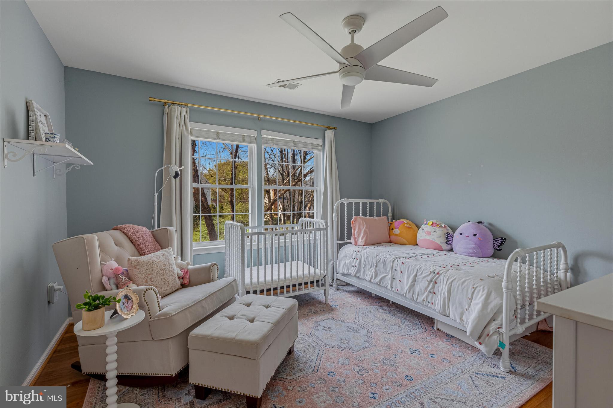 1403 Harle Place Southwest Leesburg, VA 20175 - Photo 20 of 41 a bedroom with furniture and a large window