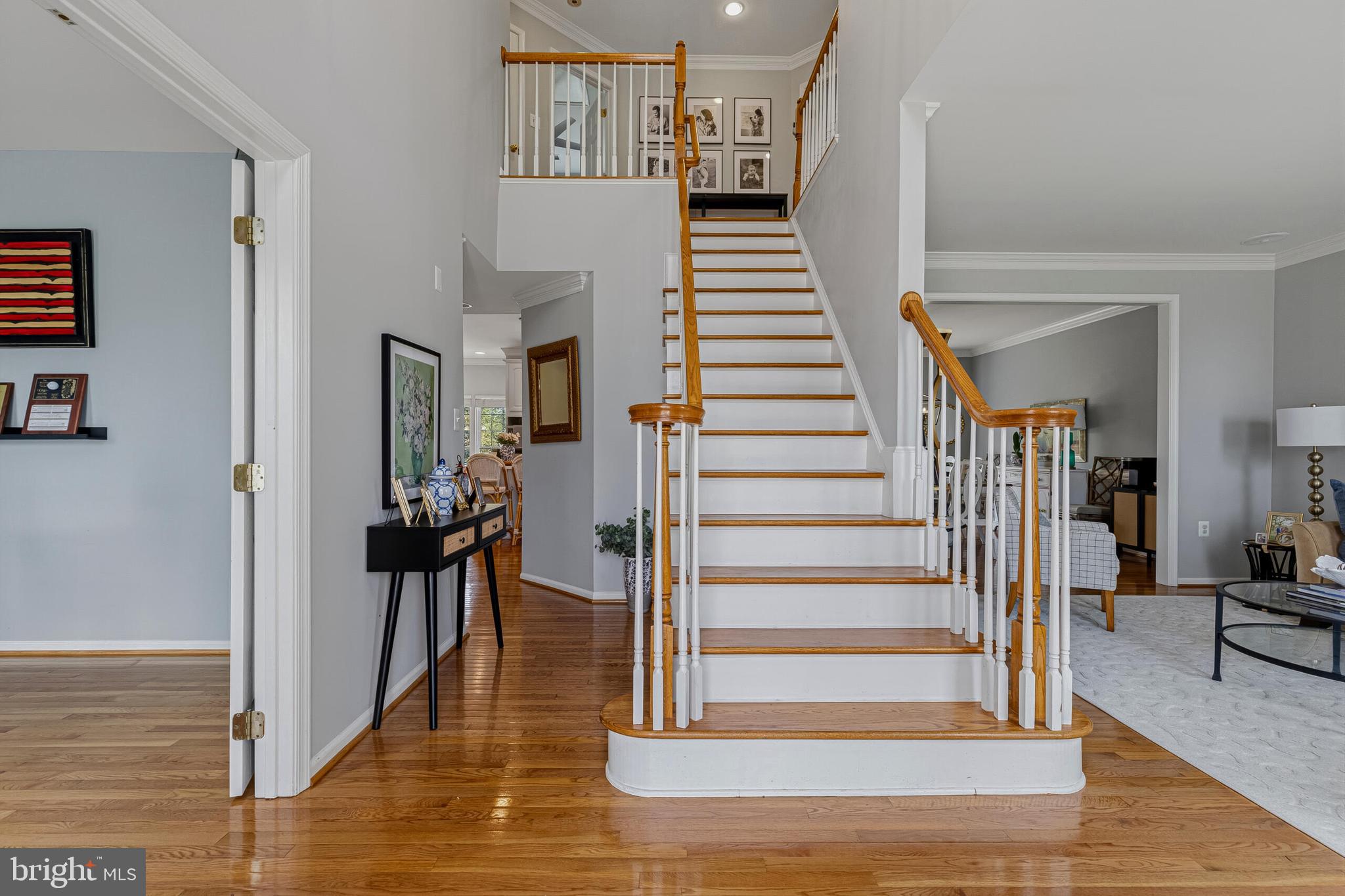 1403 Harle Place Southwest Leesburg, VA 20175 - Photo 2 of 41 a view of entryway and hall with wooden floor