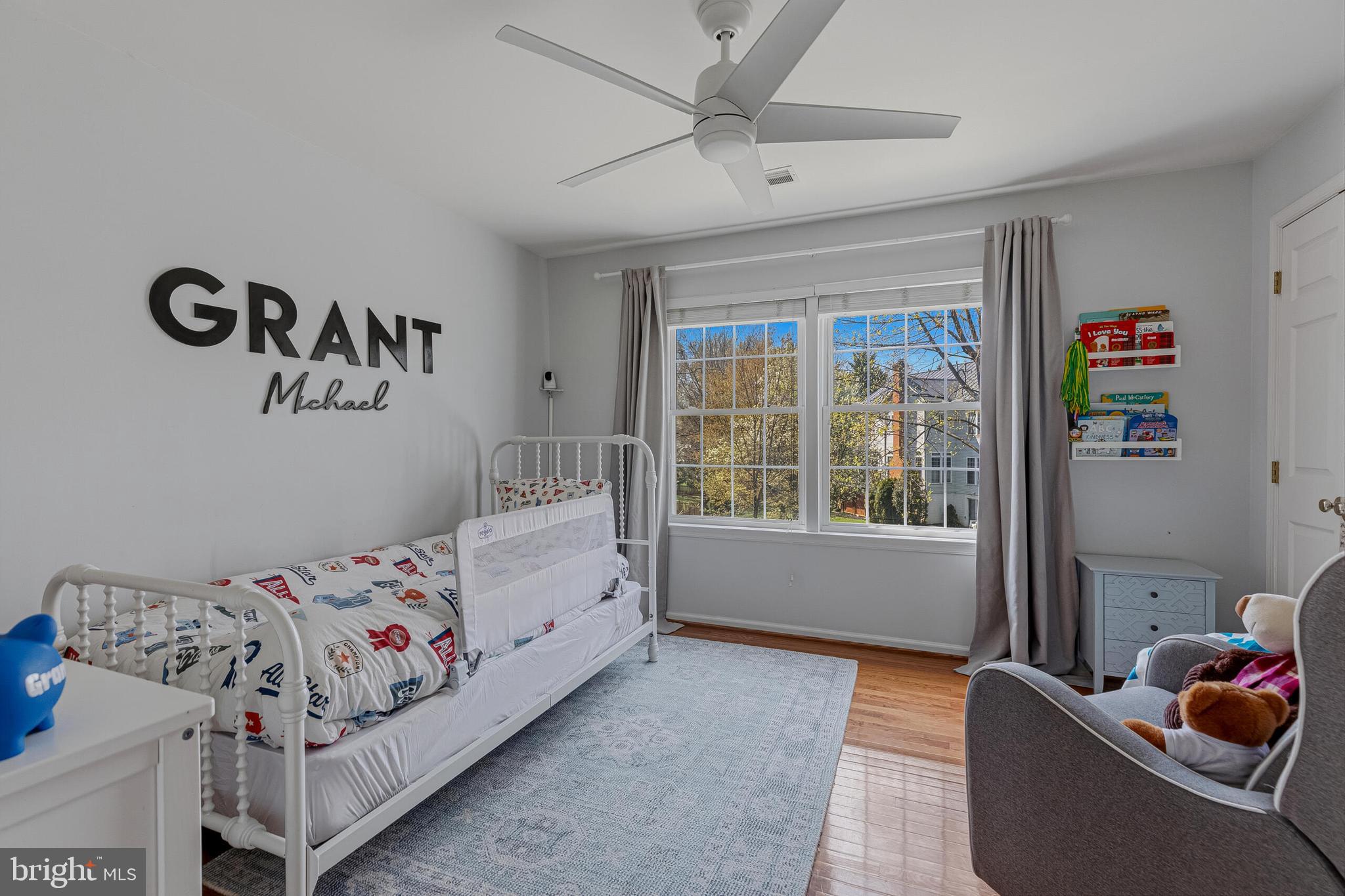 1403 Harle Place Southwest Leesburg, VA 20175 - Photo 22 of 41 a bedroom with a bed and a window