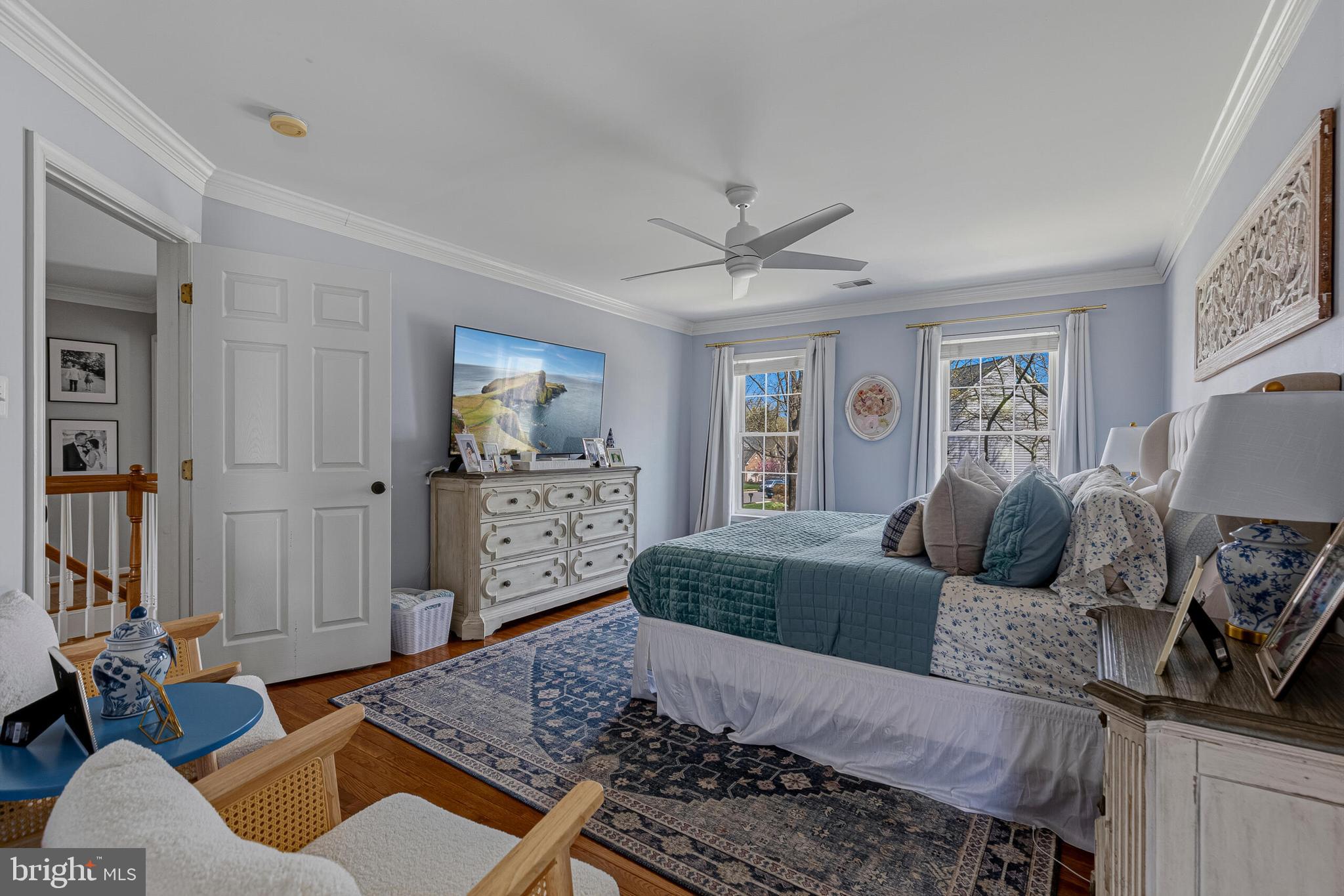 1403 Harle Place Southwest Leesburg, VA 20175 - Photo 24 of 41 a living room with furniture and wooden floor
