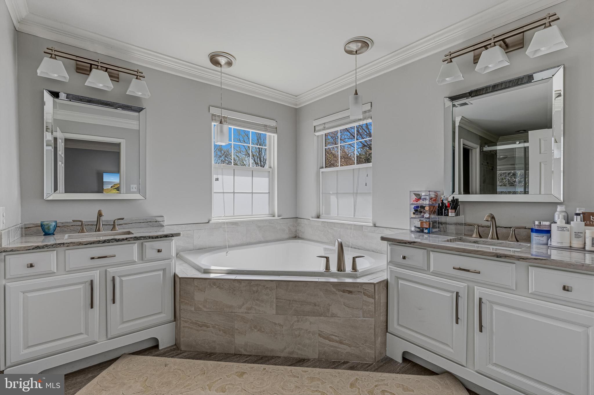 1403 Harle Place Southwest Leesburg, VA 20175 - Photo 28 of 41 a bathroom with a tub sink and mirror