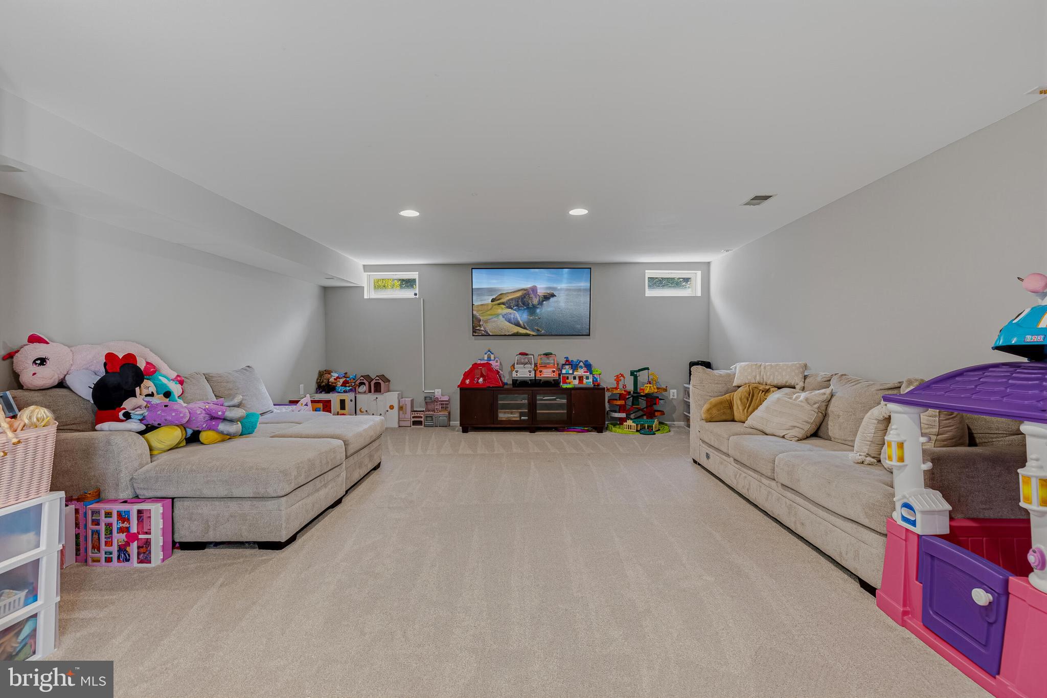 1403 Harle Place Southwest Leesburg, VA 20175 - Photo 32 of 41 a living room with furniture and a couch