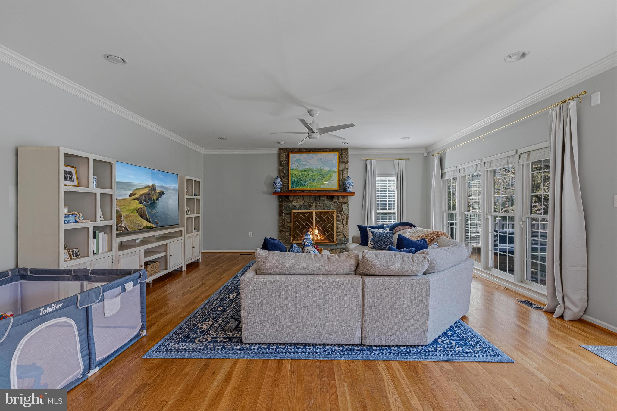 1403 Harle Place Southwest Leesburg, VA 20175 - Photo 9 of 41 a living room with furniture and a flat screen tv