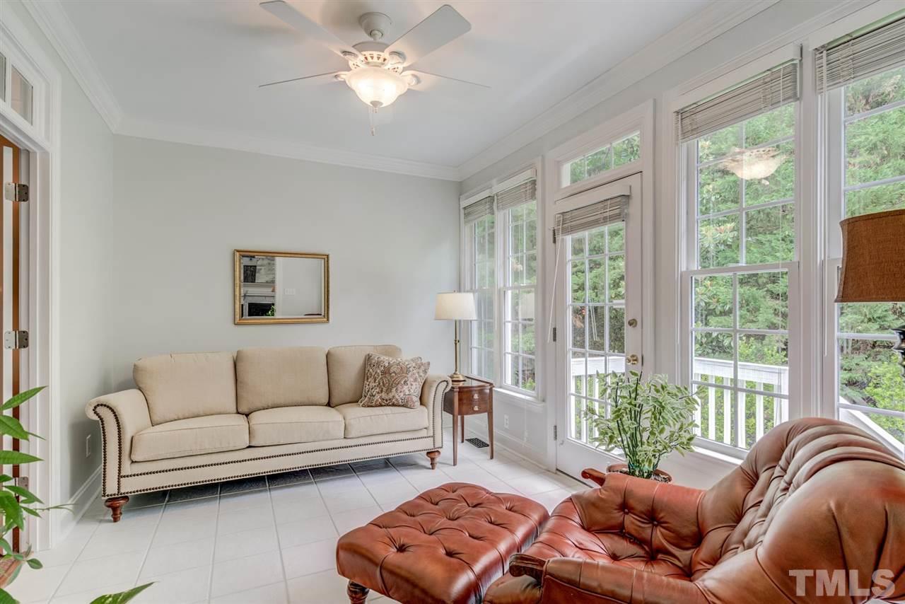 3606 Burwell Rollins Circle Raleigh, NC 27612 - Photo 17 of 30 a living room with furniture and a large window
