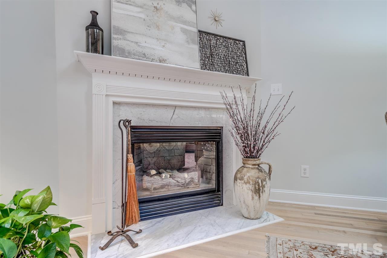 3606 Burwell Rollins Circle Raleigh, NC 27612 - Photo 21 of 30 a closeup of a fireplace