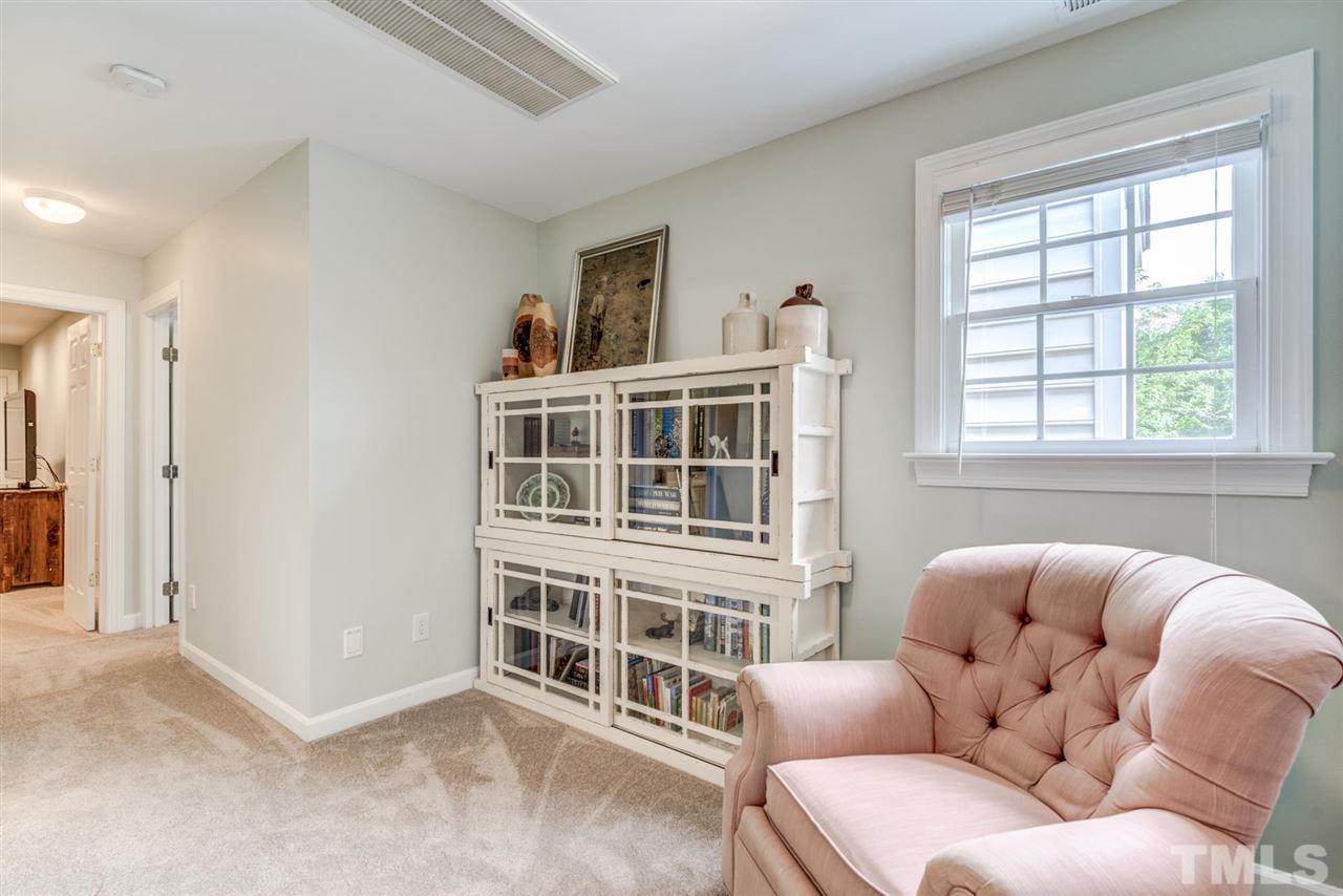 3606 Burwell Rollins Circle Raleigh, NC 27612 - Photo 22 of 30 a bedroom with furniture and a window