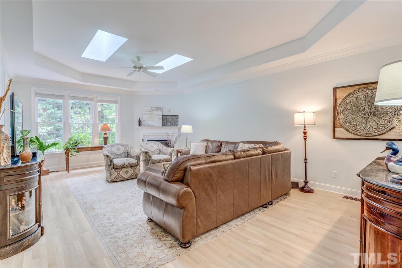 3606 Burwell Rollins Circle Raleigh, NC 27612 - Photo 6 of 30 a living room with furniture and a large window