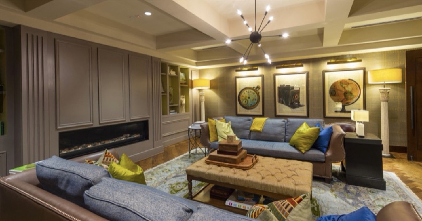 2303 Mid Lane, Unit 318 Houston, TX 77027 - Photo 21 of 25 a living room with furniture and a chandelier