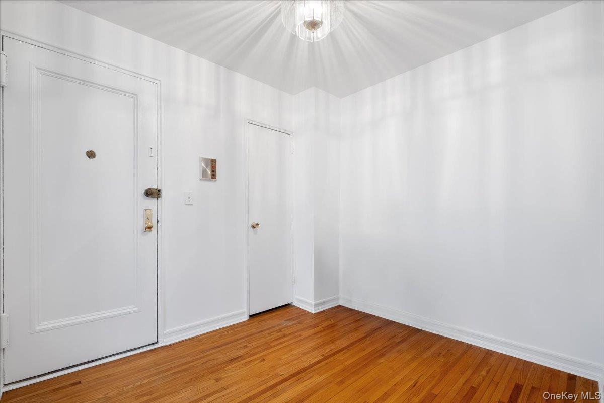 142 Garth Road, Unit 5K Scarsdale, NY 10583 - Photo 4 of 33 Entrance Foyer with hall closets - this space is also a dining area
