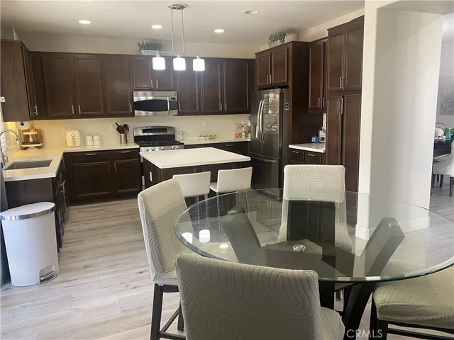 a view of front door with wooden floor