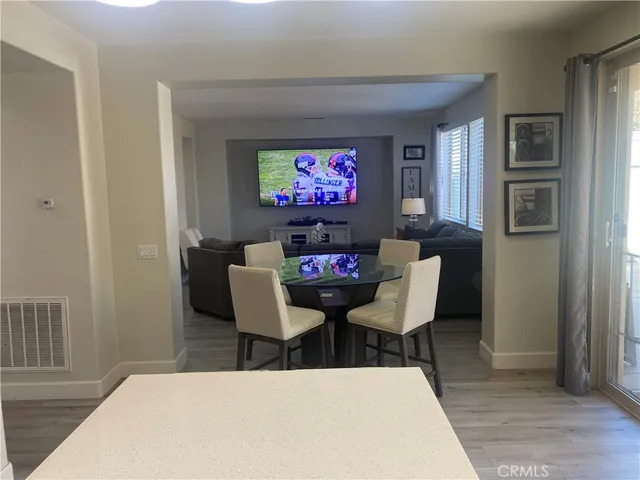 a bedroom with a bed window and couch