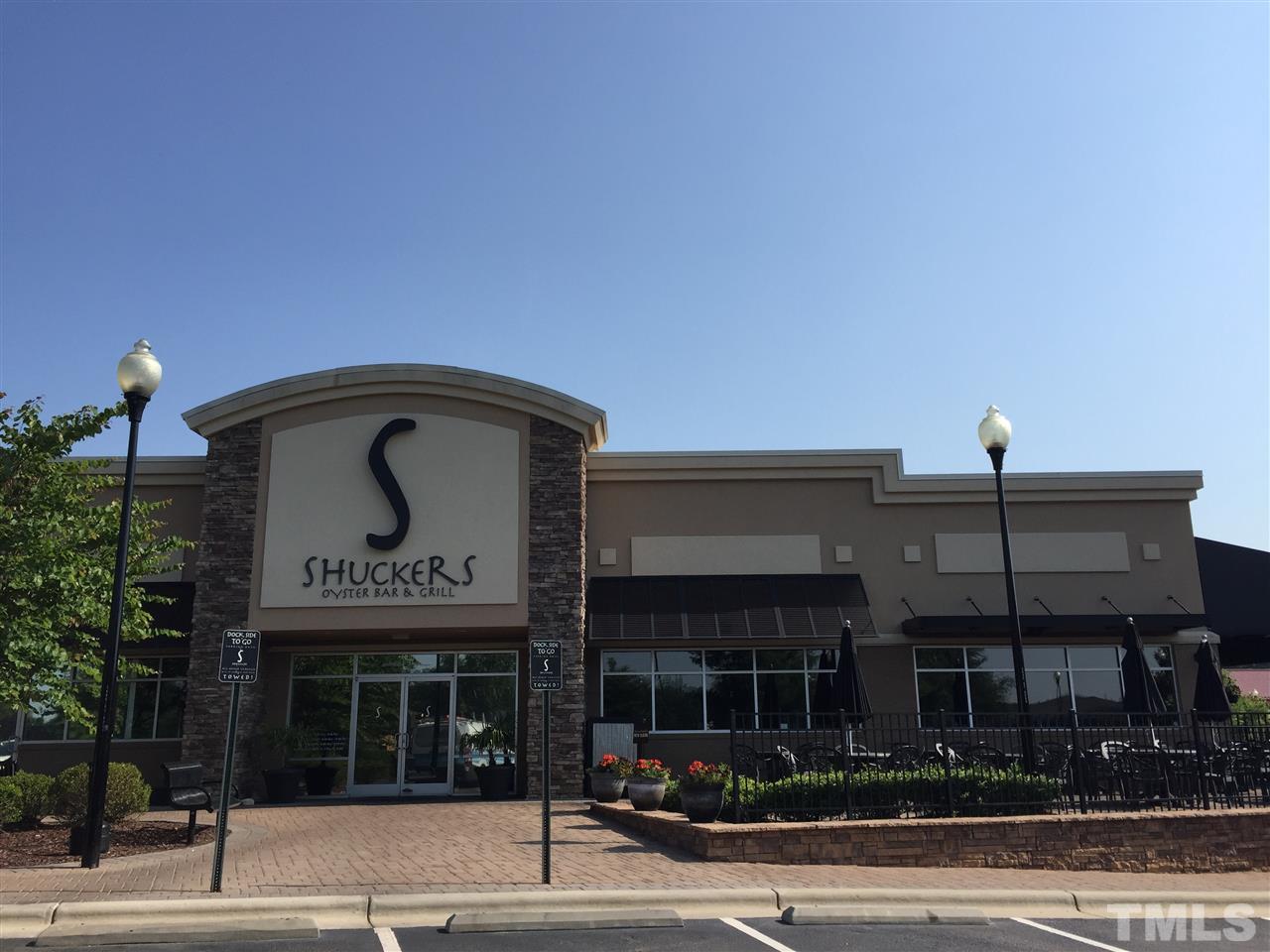7464 Randshire Way Raleigh, NC 27616 - Photo 22 of 25 a view of a building with a street