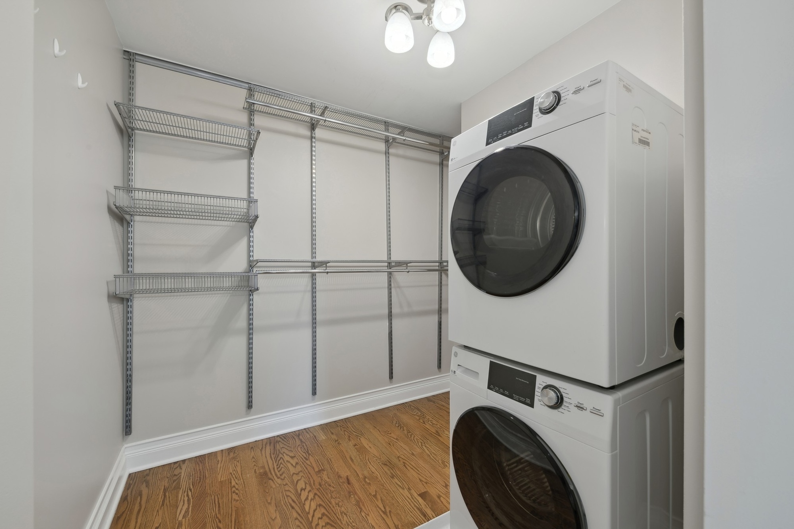 2 East Erie Street, Unit 1501 Chicago, IL 60611 - Photo 16 of 18 a utility room with dryer and washer