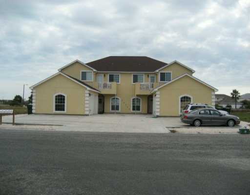 a house view with a garden space