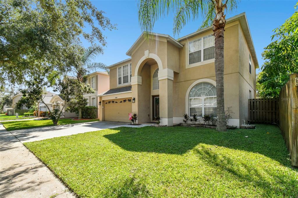 5707 Butterfield Street Riverview, FL 33578 - Photo 2 of 67 a front view of a house with a yard