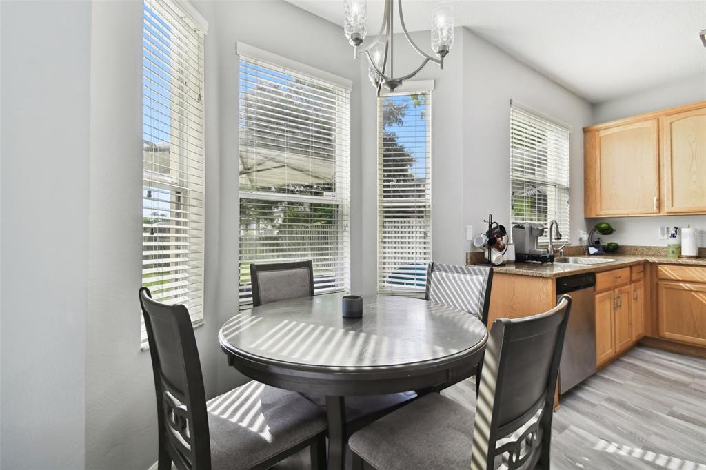 5707 Butterfield Street Riverview, FL 33578 - Photo 25 of 67 a view of a dining room with furniture window and outside view