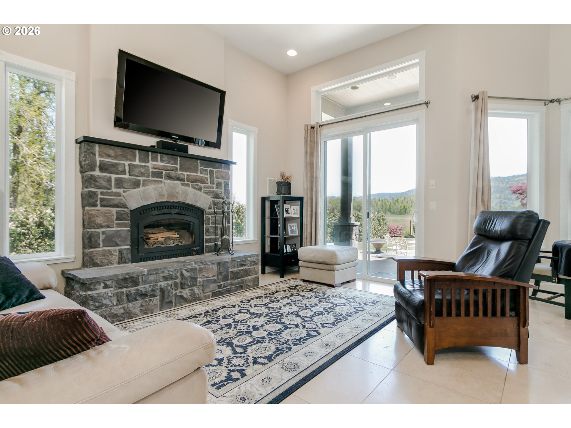 33391 Howe Lane Creswell, OR 97426 - Photo 15 of 40 a living room with furniture and a fireplace