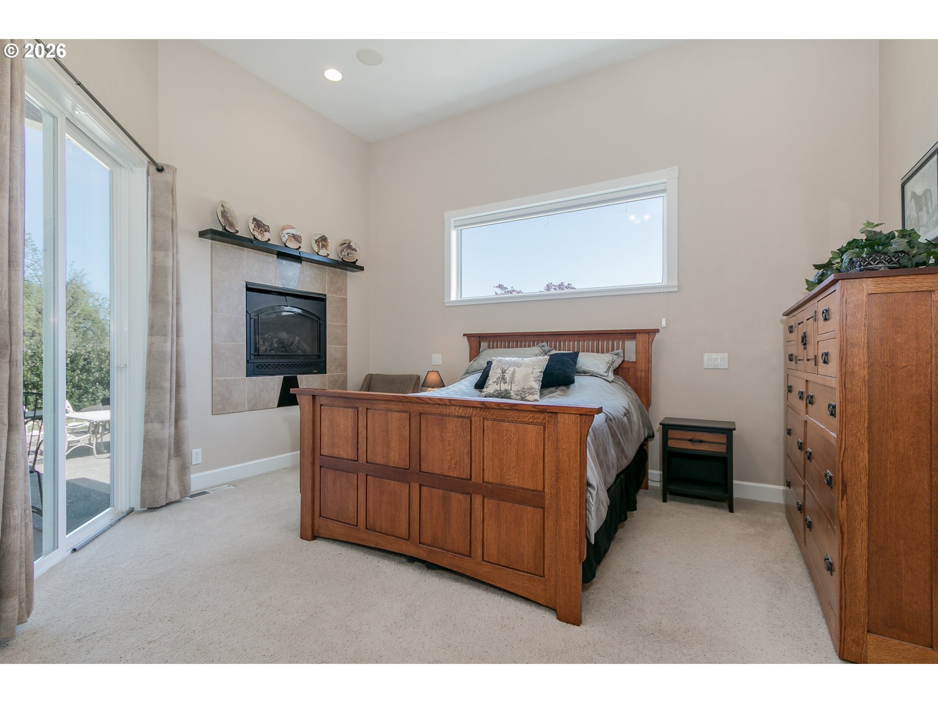 33391 Howe Lane Creswell, OR 97426 - Photo 18 of 40 a bed room with a bed and a television