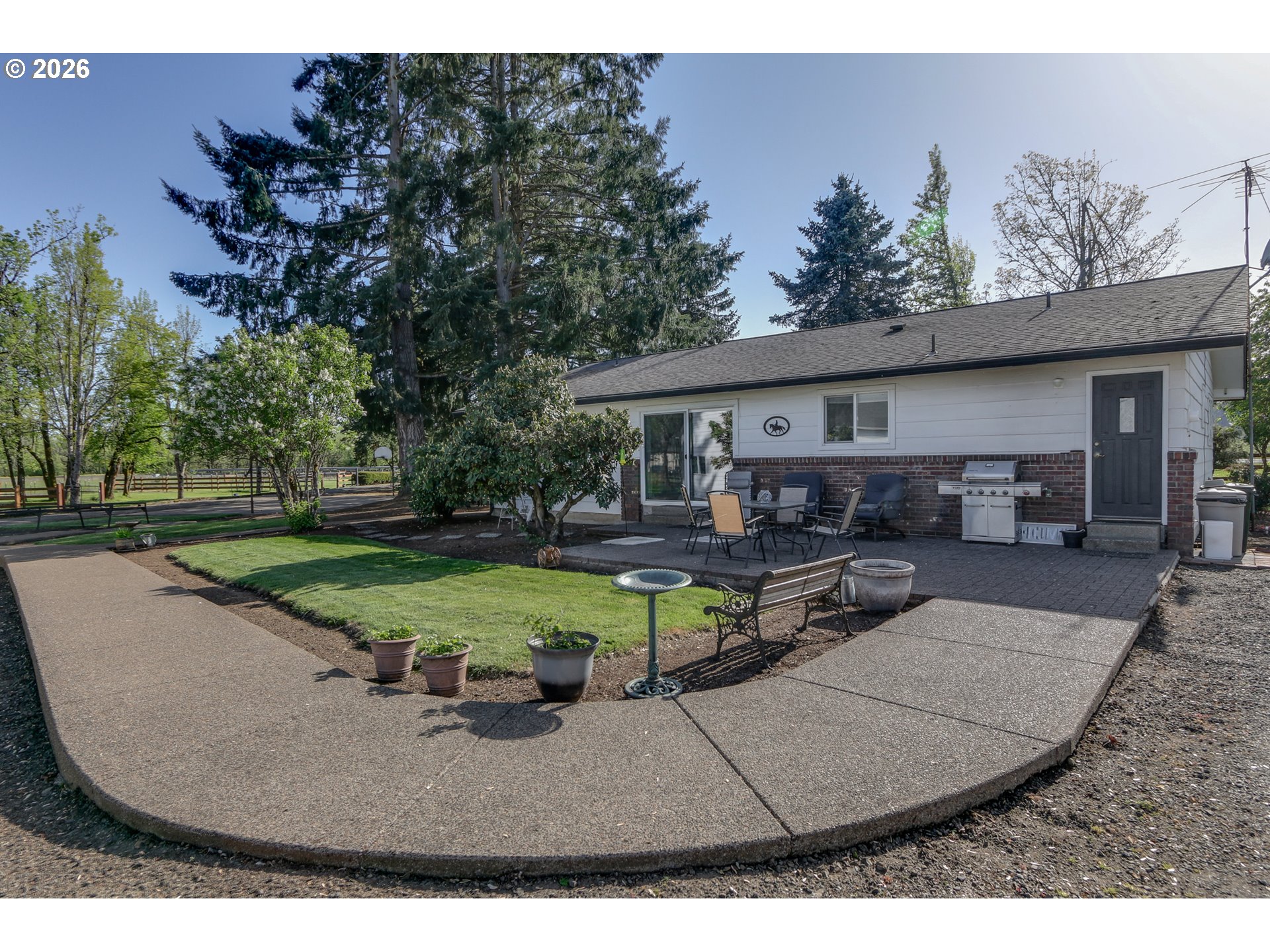 33391 Howe Lane Creswell, OR 97426 - Photo 23 of 40 an outdoor space with furniture and garden