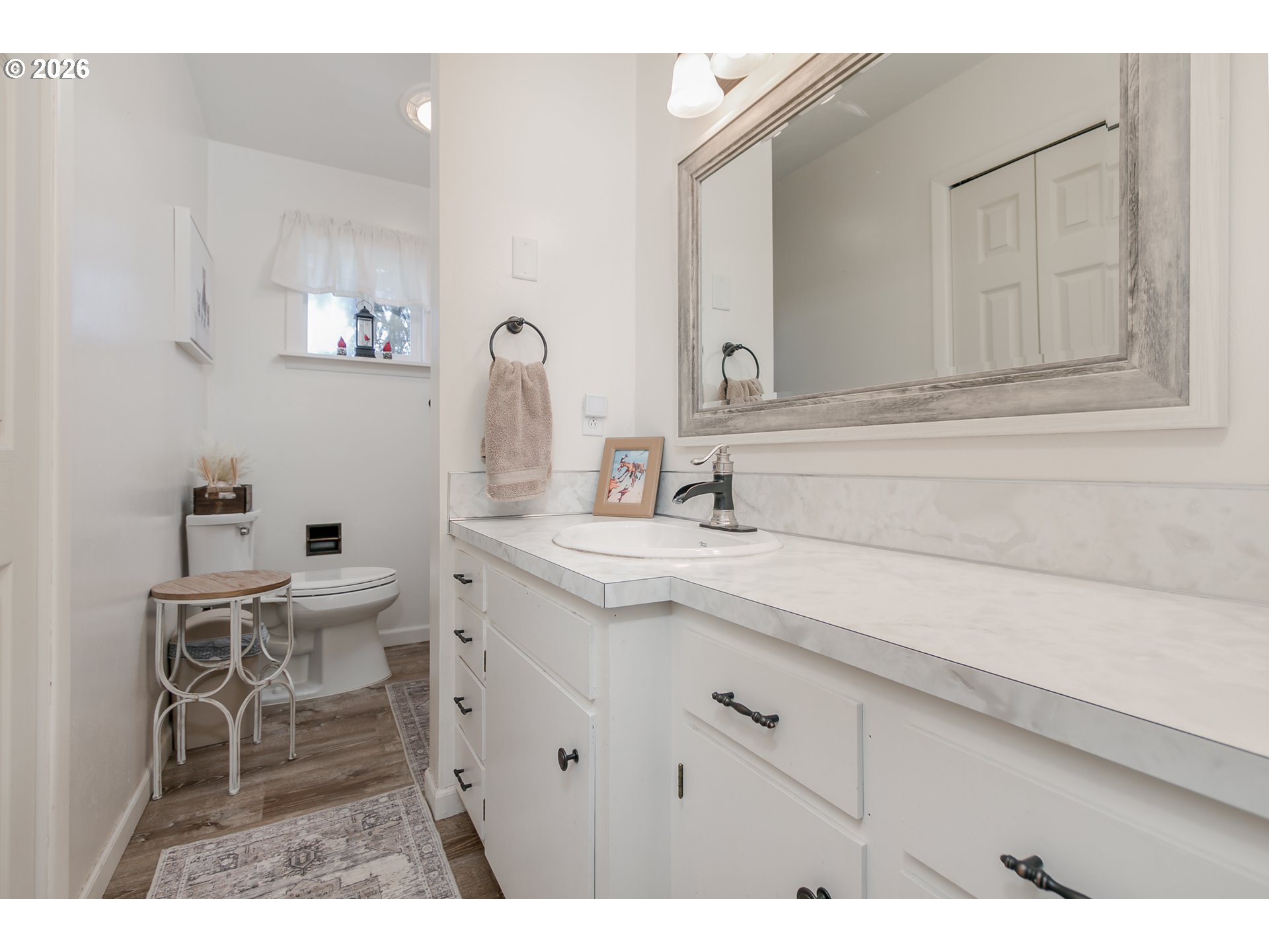 33391 Howe Lane Creswell, OR 97426 - Photo 29 of 40 a bathroom with a sink vanity and a mirror