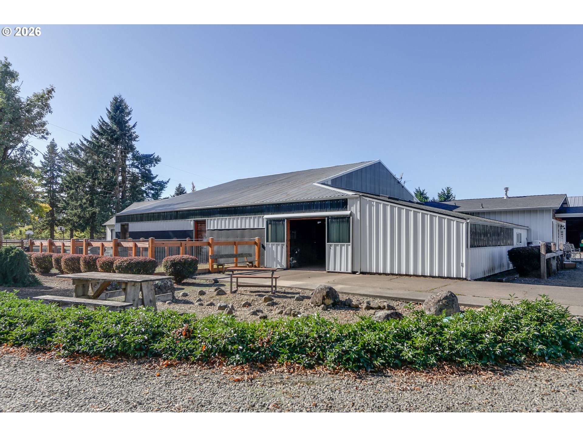 33391 Howe Lane Creswell, OR 97426 - Photo 3 of 40 a front view of a house with garden