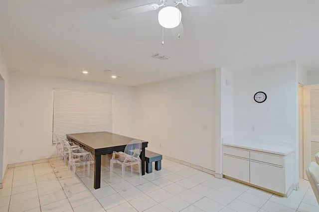 a view of cabinets and wooden floor