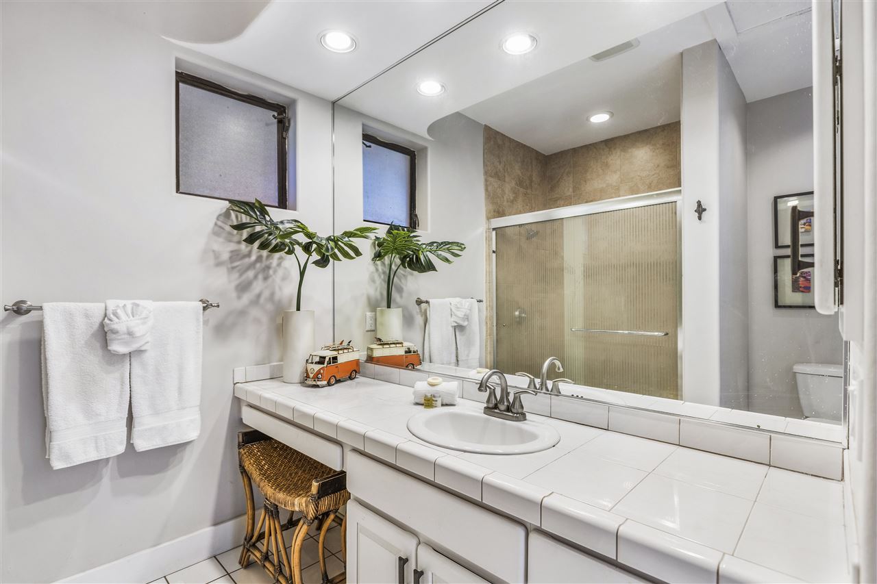 5432 Lower Honoapiilani Road, Unit B7 Lahaina, HI 96761 - Photo 12 of 27 a bathroom with a sink and a mirror