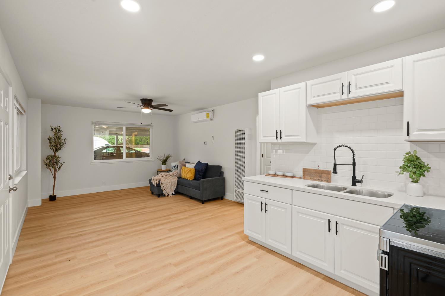 1719 West Swain Road, Unit A Stockton, CA 95207 - Photo 12 of 25 a spacious bedroom with a bed and a dresser
