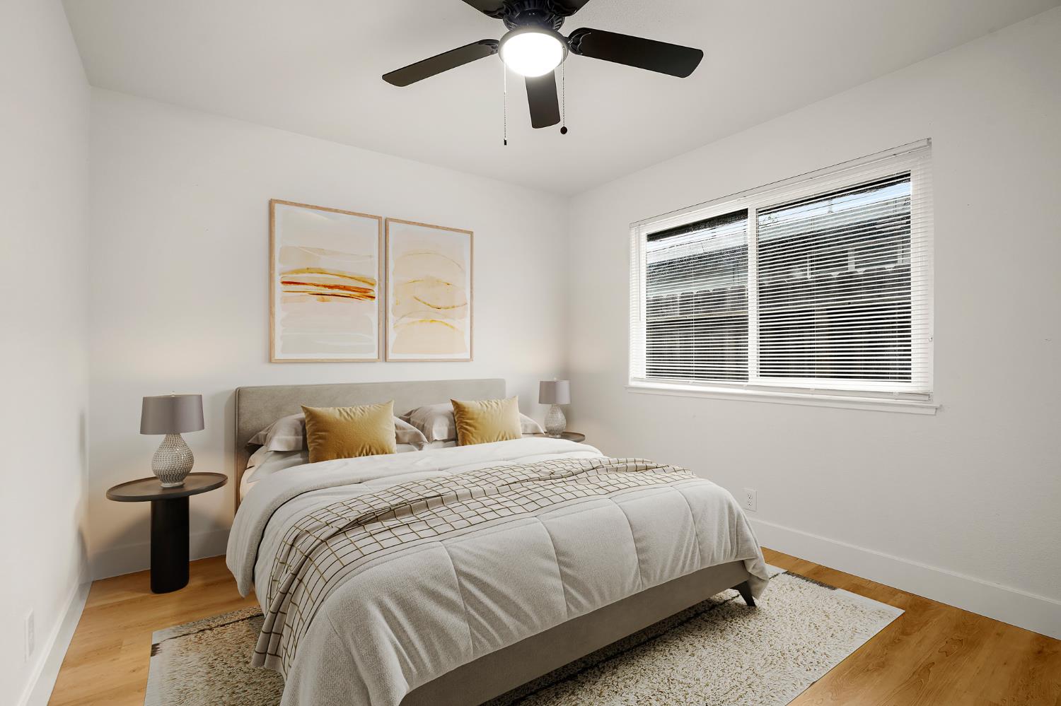 1719 West Swain Road, Unit A Stockton, CA 95207 - Photo 21 of 25 a bedroom with a bed and a window