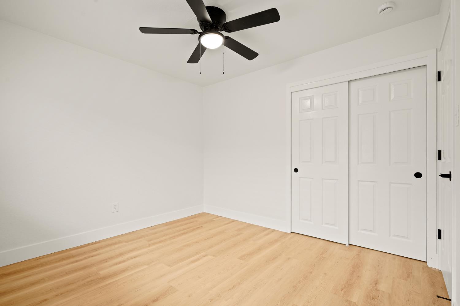 1719 West Swain Road, Unit A Stockton, CA 95207 - Photo 22 of 25 wooden floor in an empty room
