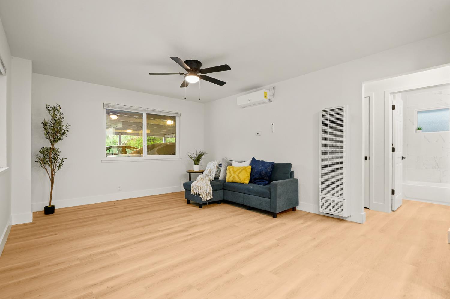 1719 West Swain Road, Unit A Stockton, CA 95207 - Photo 6 of 25 a bed room with furniture and a window