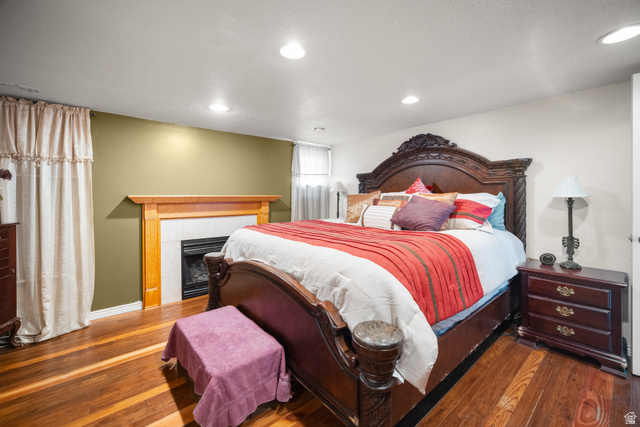 3233 Jean Street Magna, UT 84044 - Photo 14 of 33 Bedroom with wood-finish flooring, recessed lighting, and a white trim baseboard