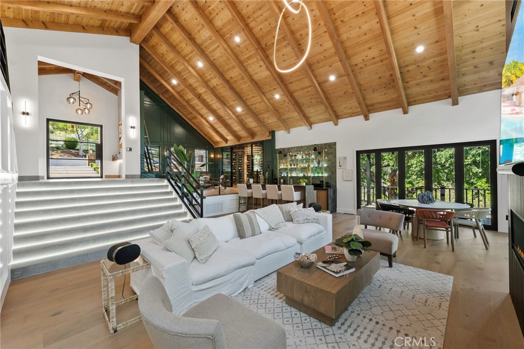 5510 Hoback Glen Road Hidden Hills, CA 91302 - Photo 11 of 60 a living room with furniture and a large window