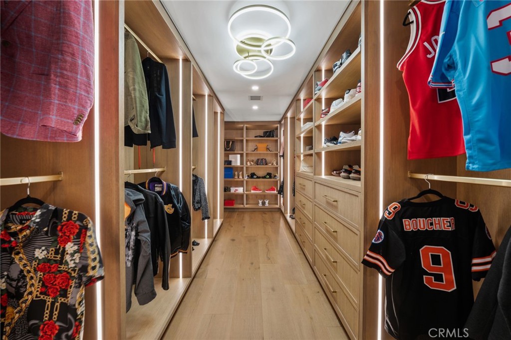 5510 Hoback Glen Road Hidden Hills, CA 91302 - Photo 38 of 60 a view of a walk in closet