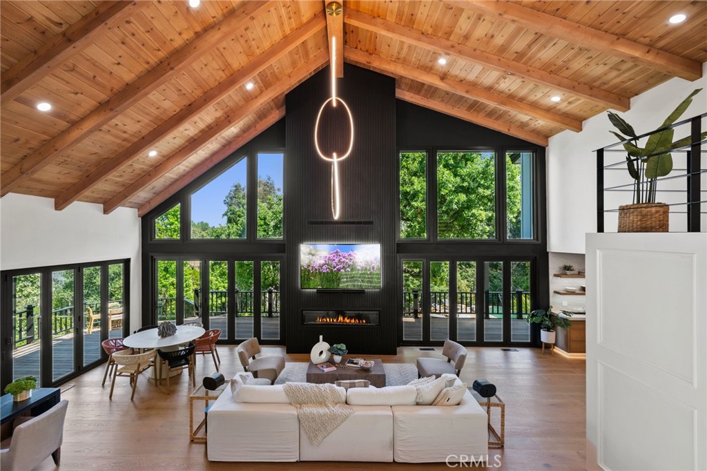 5510 Hoback Glen Road Hidden Hills, CA 91302 - Photo 4 of 60 a living room with furniture and a large window