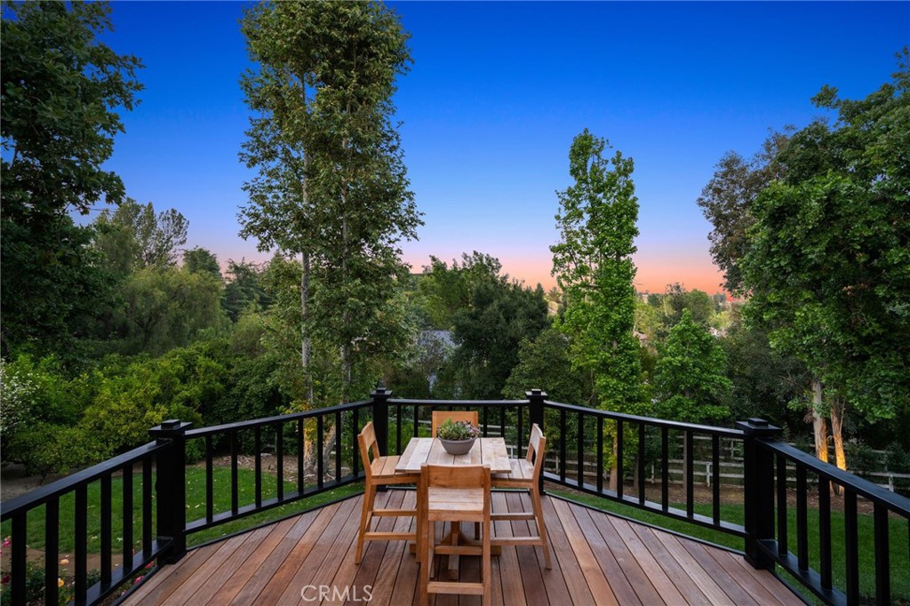5510 Hoback Glen Road Hidden Hills, CA 91302 - Photo 45 of 60 a view of a balcony with wooden floor and fence