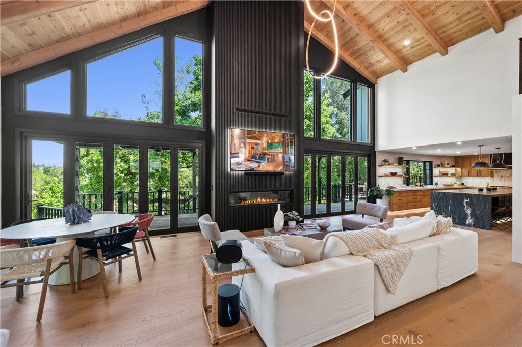 5510 Hoback Glen Road Hidden Hills, CA 91302 - Photo 6 of 60 a living room with furniture and a large window