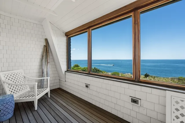 a bedroom with a bed and a fireplace