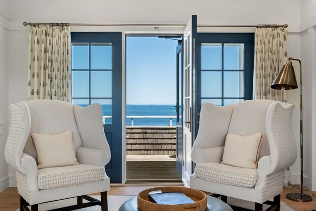 a bedroom with a bed and ceiling fan