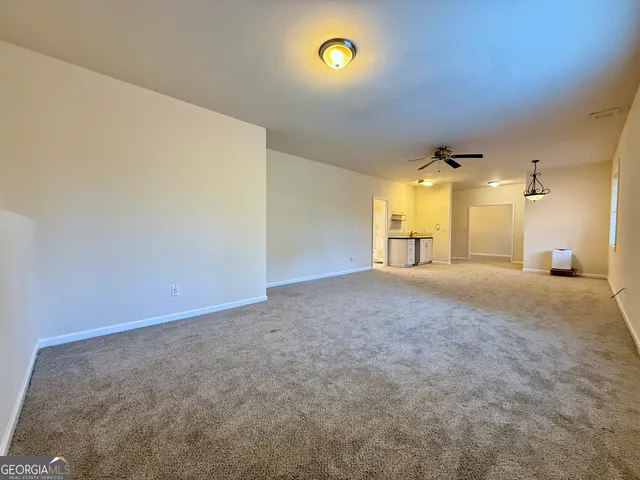 a view of a house with a street