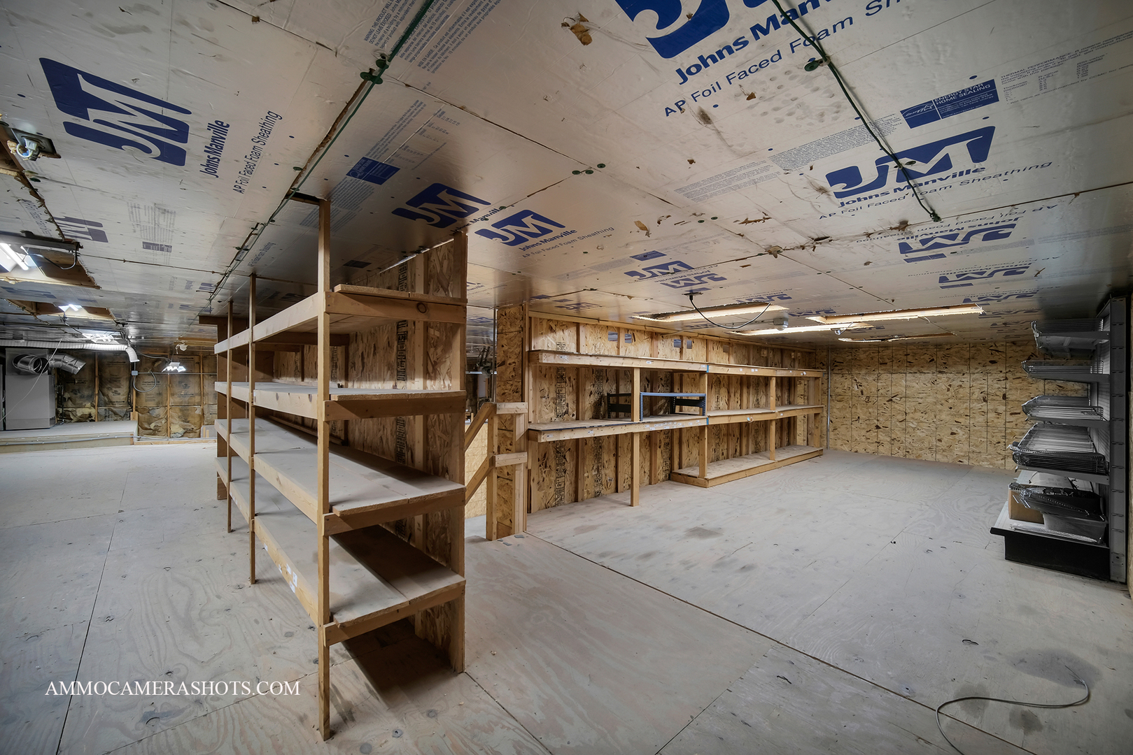 115 South Wolfe Street Sandwich, IL 60548 - Photo 18 of 22 a view of a garage with wooden cabinets