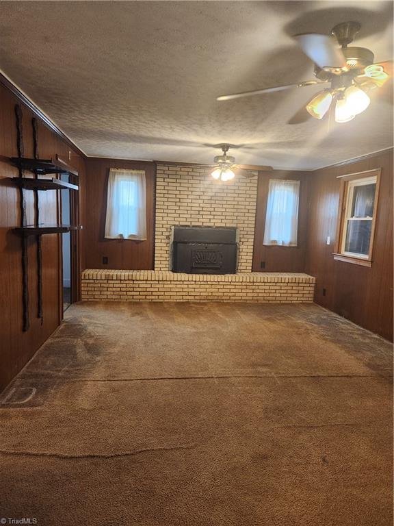 Den facing fireplace