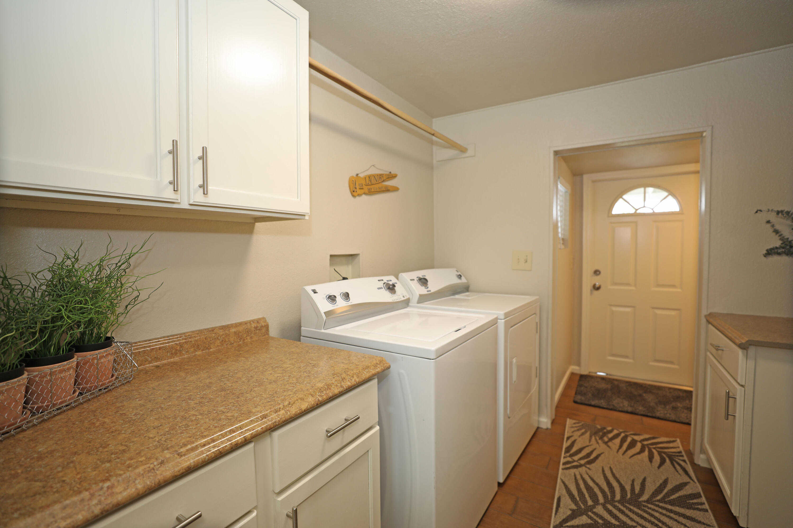 1183 Fox Den Drive Redding, CA 96003 - Photo 12 of 17 a utility room with dryer and washer