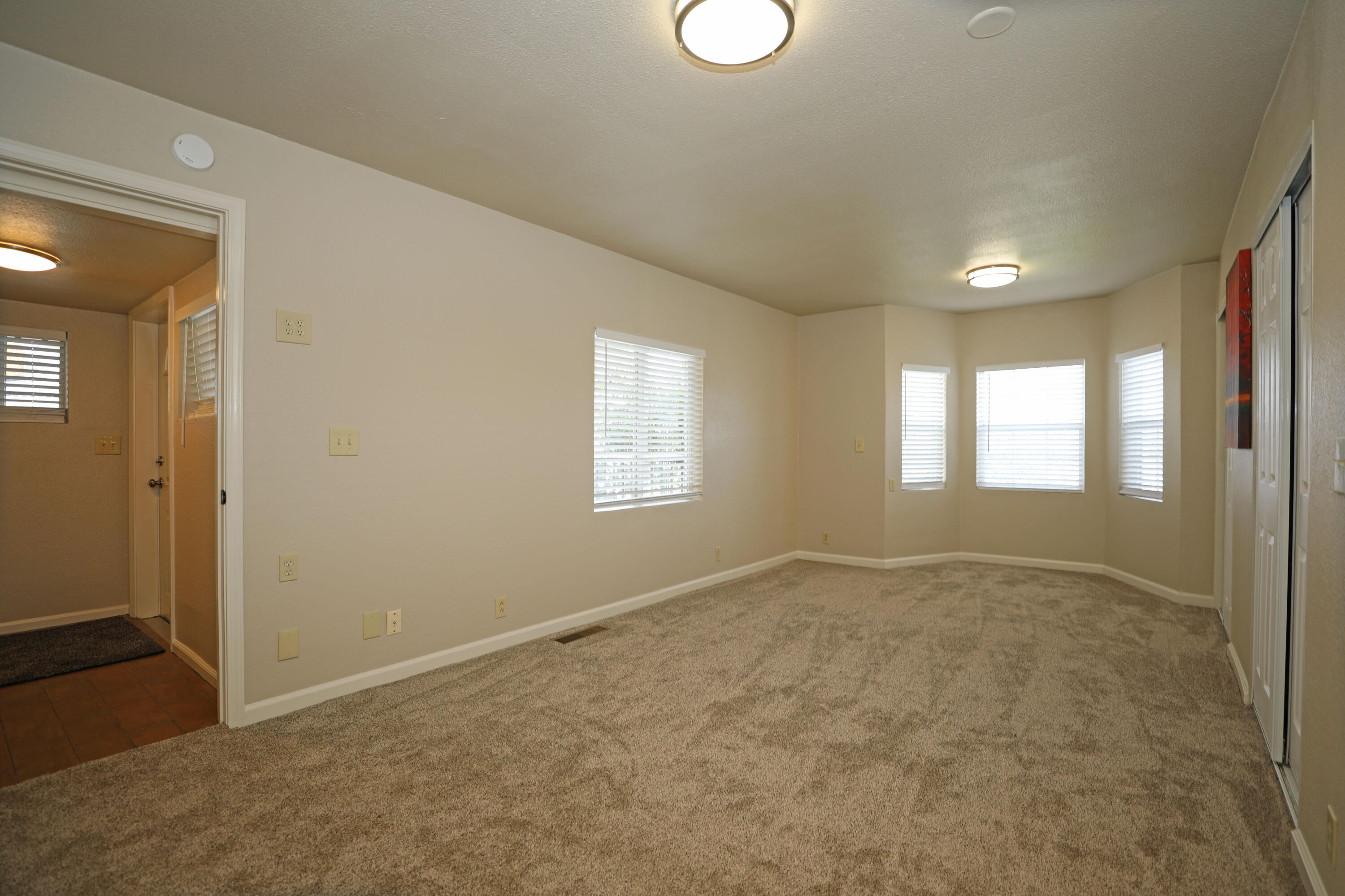 1183 Fox Den Drive Redding, CA 96003 - Photo 7 of 17 a view of an empty room and window