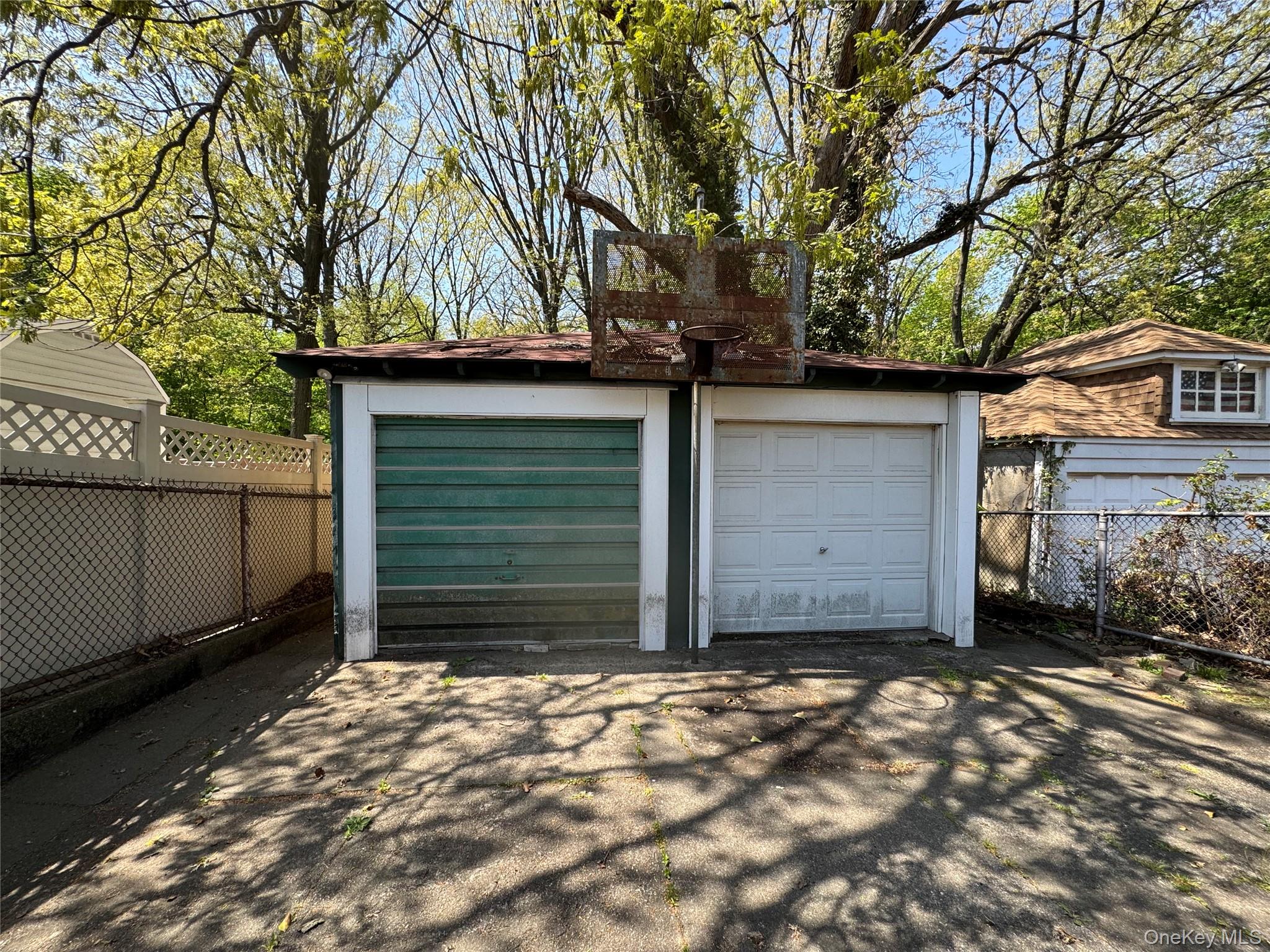 82-72 88th Place Queens, NY 11421 - Photo 24 of 26 a front view of a house