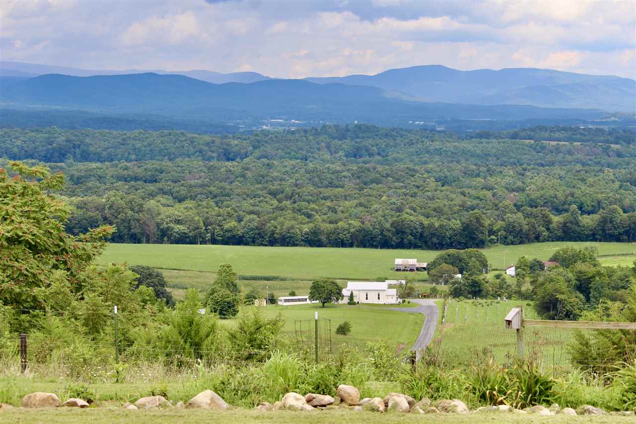 1185 Bunker Hill Road Mount Solon, VA 22843 - Photo 32 of 39 a view of a city with mountains in the background