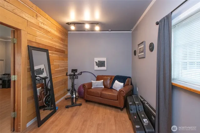 a living room with furniture and a window