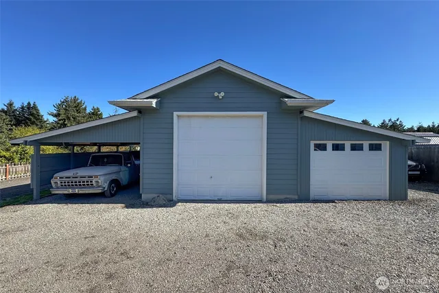 a front view of a house with a garage